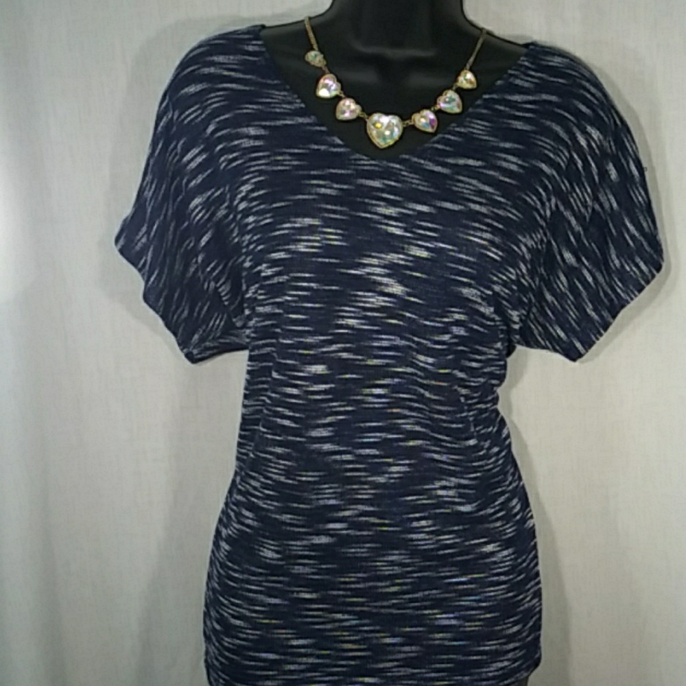 Blue with white design blouse.